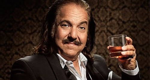 Ron jeremy with mustache and drink glasse