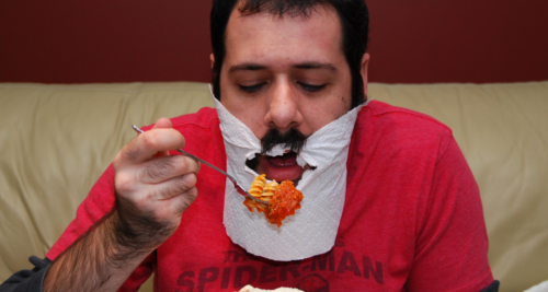 beard man eating