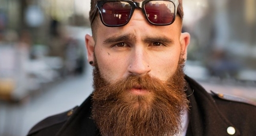 Here is a ginger beard man using beard growth pills