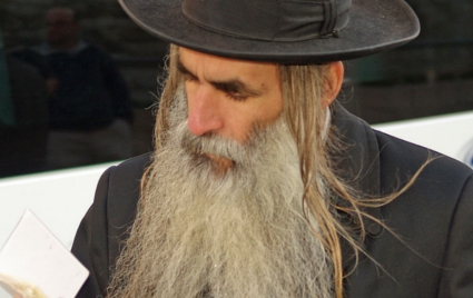 Orthodox Jew in Jerusalem with an unshaved beard and peyos 